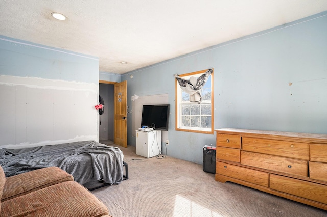 bedroom featuring light carpet