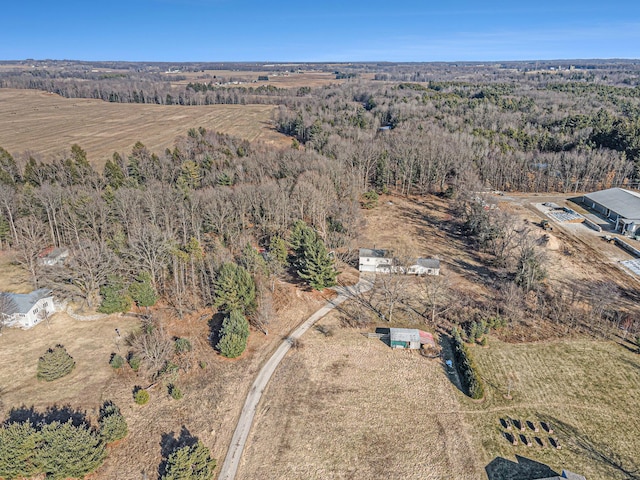 aerial view featuring a forest view