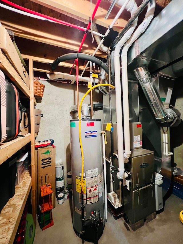 utilities featuring heating unit and gas water heater