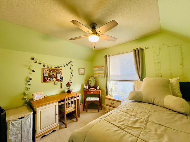 bedroom featuring light colored carpet, a textured ceiling, ceiling fan, and vaulted ceiling