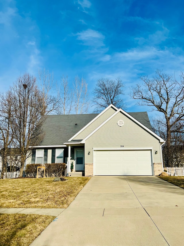 view of front of home with a garage, brick siding, driveway, and a shingled roof