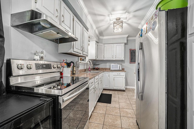 kitchen with under cabinet range hood, ornamental molding, appliances with stainless steel finishes, white cabinets, and a sink