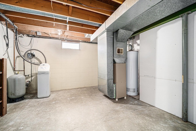 basement with gas water heater and heating unit