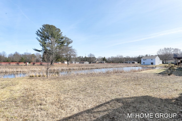 view of yard featuring a water view