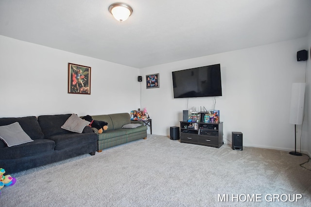 living area featuring carpet