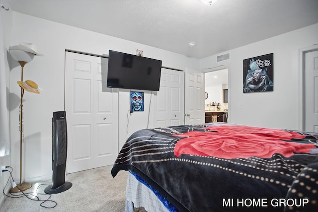 bedroom featuring visible vents and carpet floors