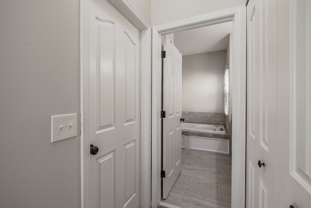 full bathroom featuring a bath