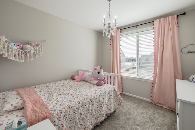 bedroom with an inviting chandelier, baseboards, and carpet floors