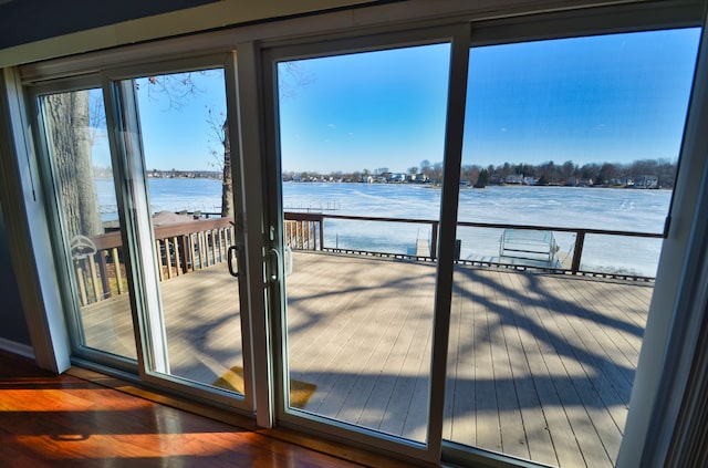 doorway featuring a water view