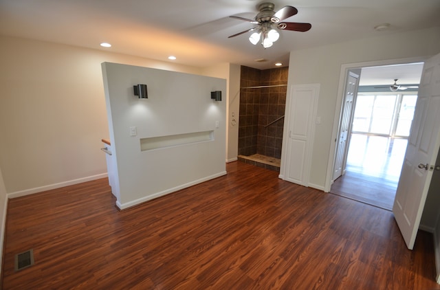 spare room featuring visible vents, ceiling fan, baseboards, recessed lighting, and dark wood-style flooring