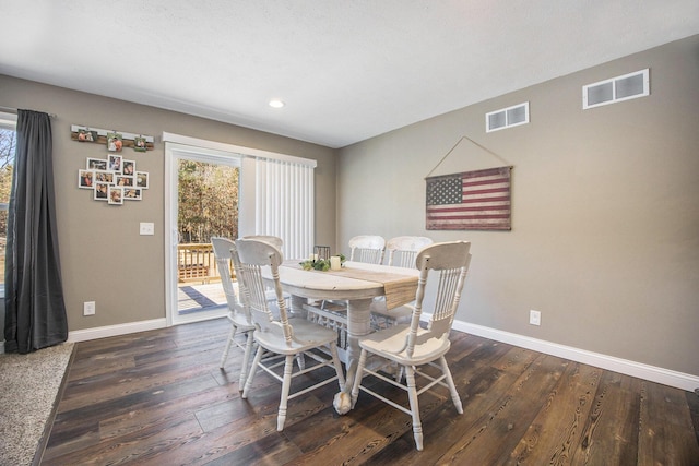 dining space with visible vents, a healthy amount of sunlight, and baseboards