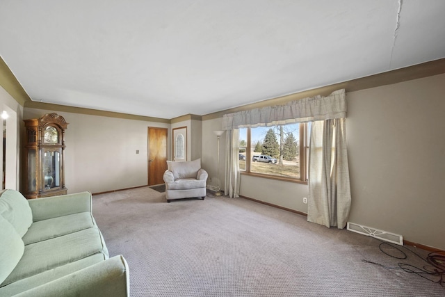 unfurnished living room with visible vents, carpet flooring, and baseboards