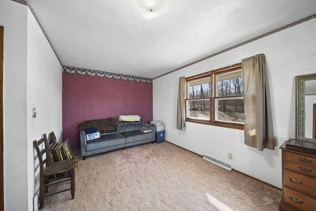 living area featuring a baseboard heating unit and carpet floors