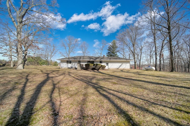 view of front facade with a front lawn