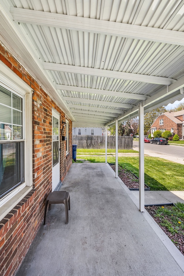 view of patio / terrace featuring fence