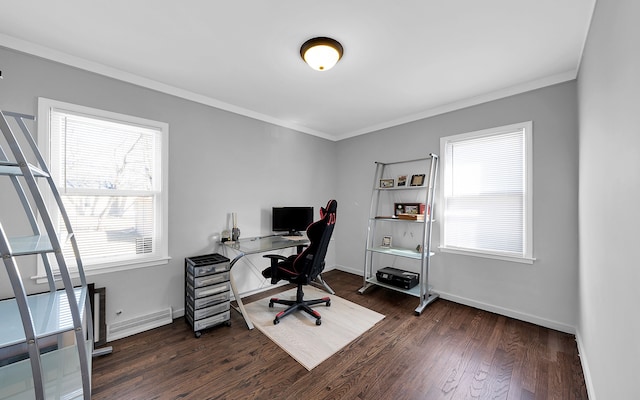 home office featuring dark wood-type flooring, baseboards, and ornamental molding