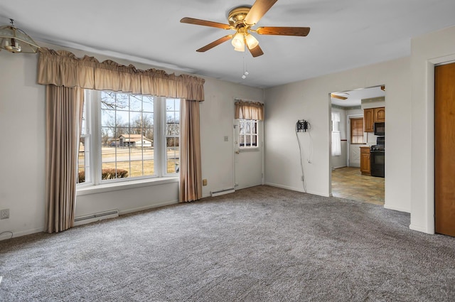 unfurnished living room featuring a baseboard heating unit, light carpet, and a ceiling fan