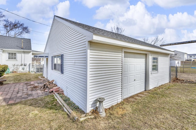 detached garage with fence