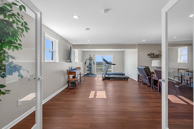 workout room featuring recessed lighting, french doors, baseboards, and wood finished floors