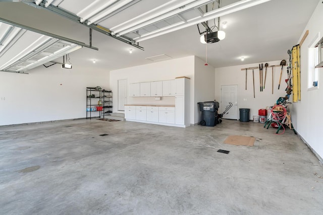 garage with a garage door opener