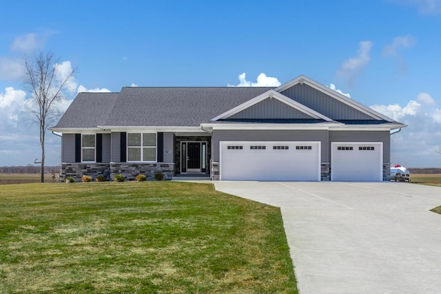 craftsman-style home featuring stone siding, driveway, a front lawn, and a garage