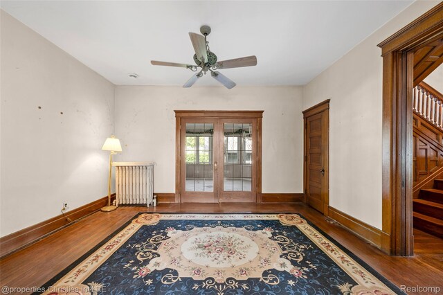 407 Westminister St, Marine City, MI 48039 - spare room featuring wood finished floors, baseboards, stairs, and french doors