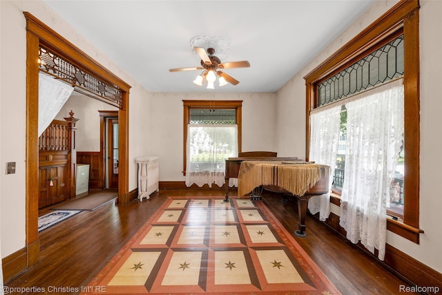 407 Westminister St, Marine City, MI 48039 - living area featuring wood finished floors, ceiling fan, and wainscoting