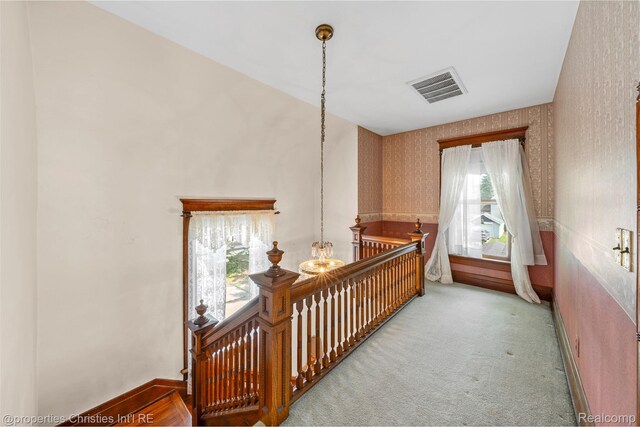 407 Westminister St, Marine City, MI 48039 - hall featuring an upstairs landing, wallpapered walls, and carpet