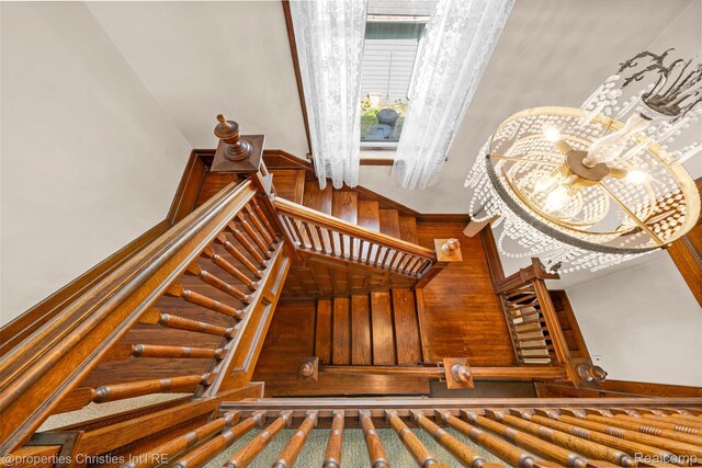 407 Westminister St, Marine City, MI 48039 - stairway with a towering ceiling and a chandelier