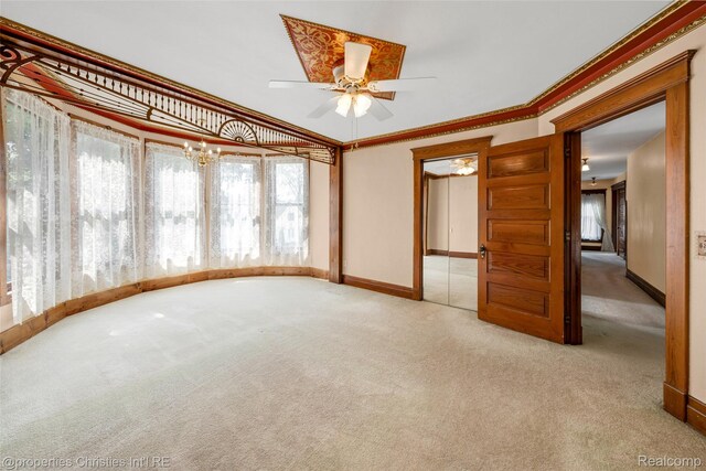 407 Westminister St, Marine City, MI 48039 - carpeted spare room with ceiling fan, baseboards, and crown molding