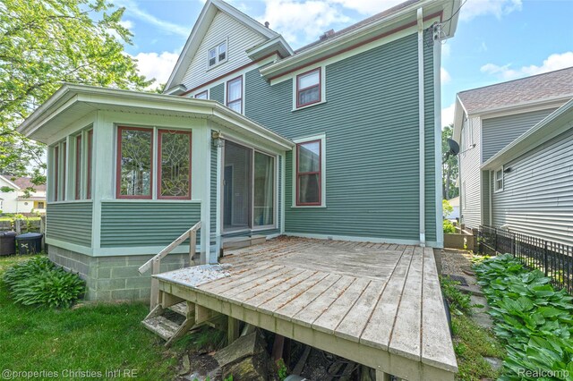407 Westminister St, Marine City, MI 48039 - rear view of property featuring a deck and a sunroom