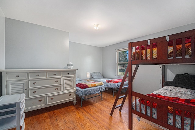 bedroom with wood finished floors