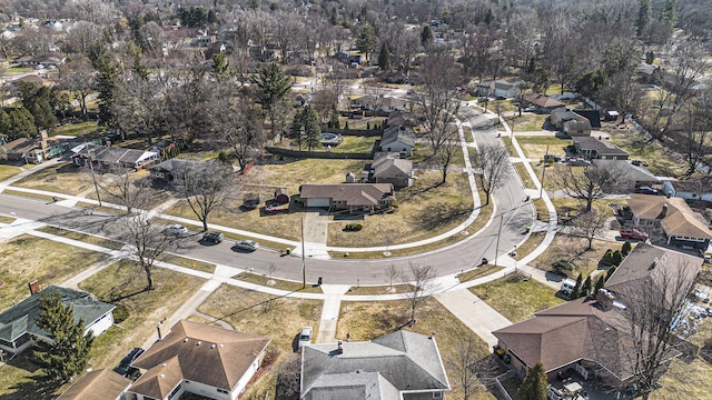 birds eye view of property with a residential view