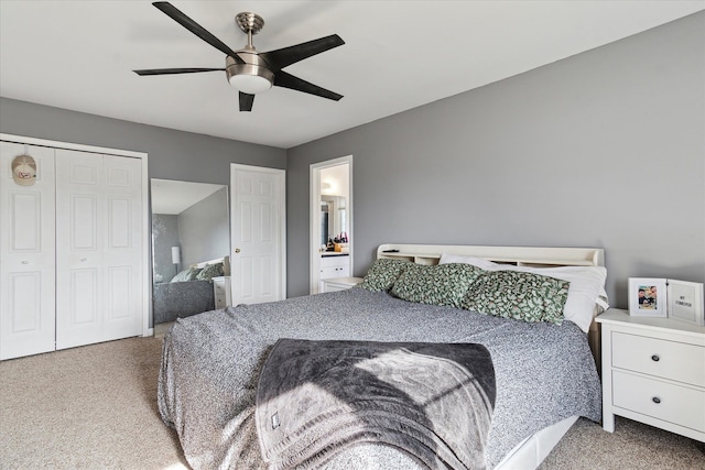 bedroom with a closet, light colored carpet, and a ceiling fan