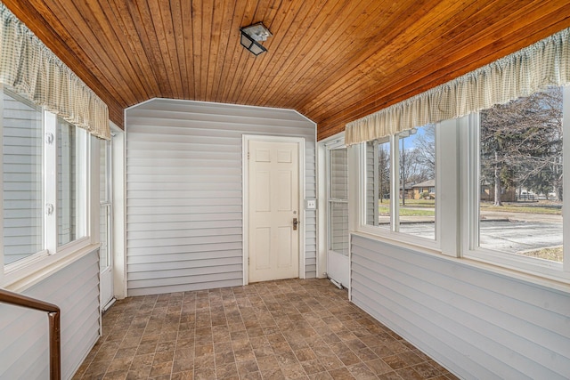 unfurnished sunroom with wooden ceiling and lofted ceiling