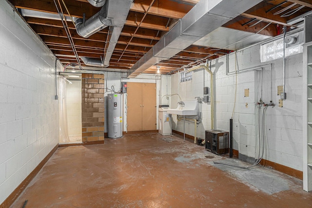 unfinished basement featuring electric water heater