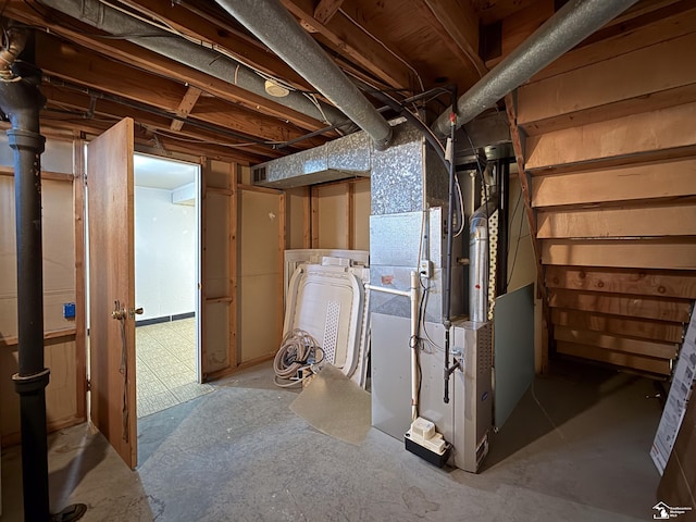 unfinished basement with heating unit