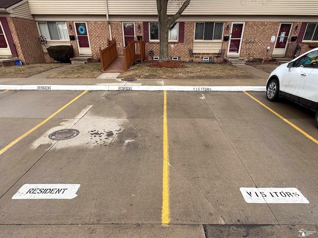 uncovered parking lot with entry steps