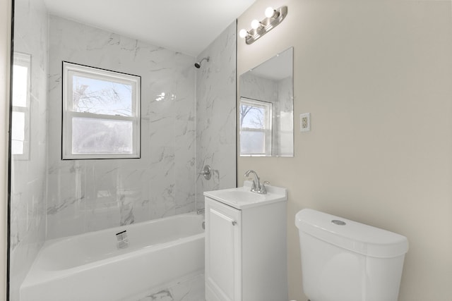 full bath with vanity, toilet, washtub / shower combination, and marble finish floor