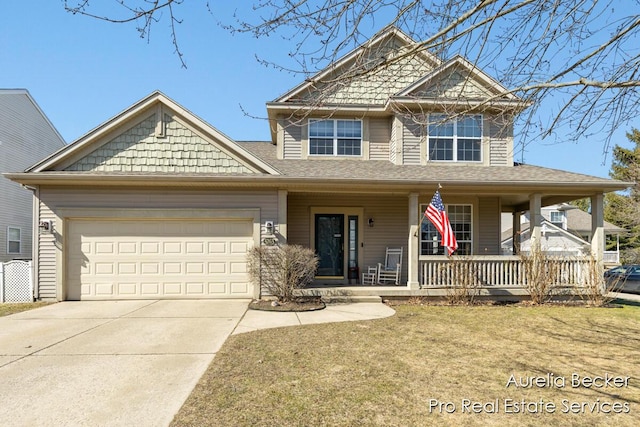 craftsman inspired home with a front yard, covered porch, concrete driveway, and an attached garage