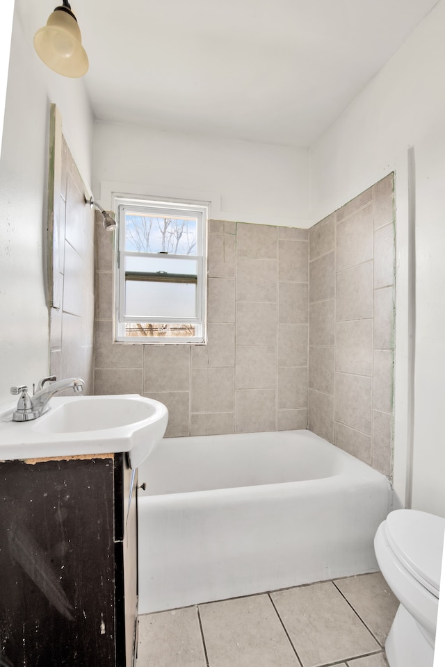 full bathroom with tile patterned floors, toilet, and vanity