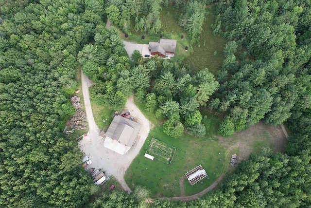 drone / aerial view with a view of trees