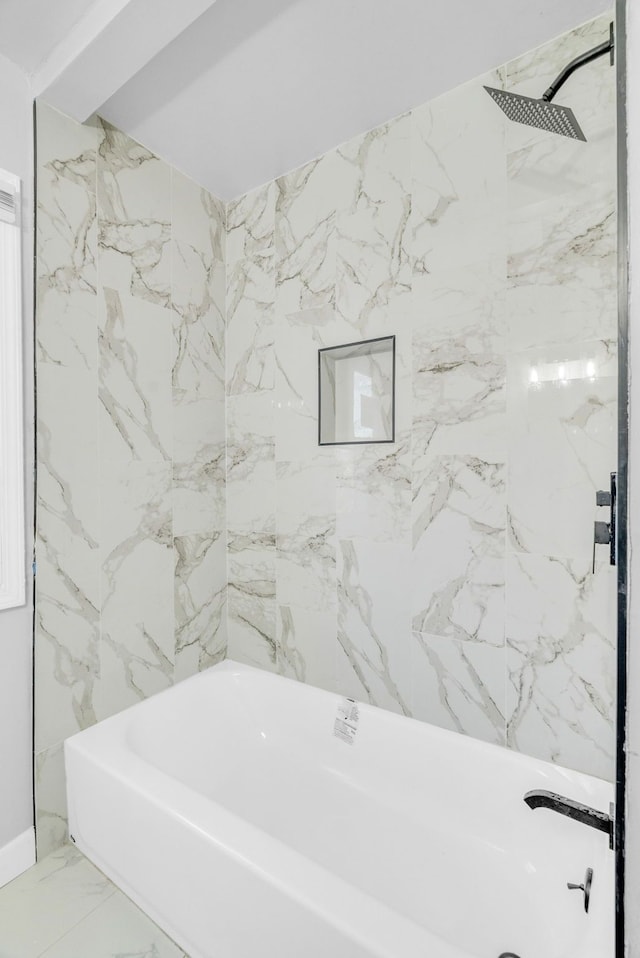 full bath with walk in shower, marble finish floor, and a washtub