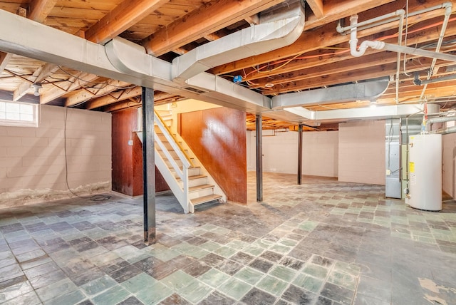 basement with stairs and water heater