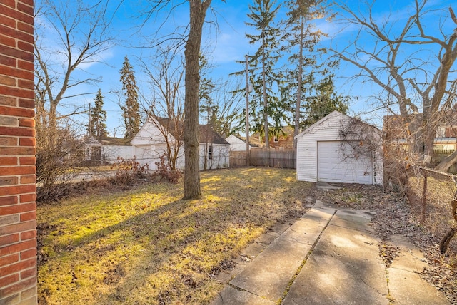 view of yard with a fenced backyard and an outdoor structure