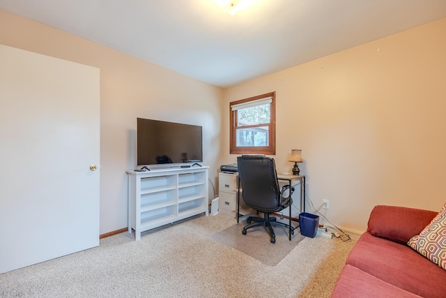 office area featuring carpet and baseboards