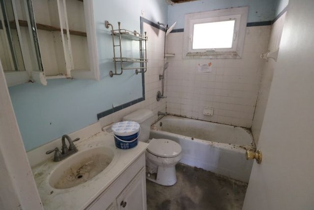 full bath featuring concrete flooring, toilet,  shower combination, and vanity