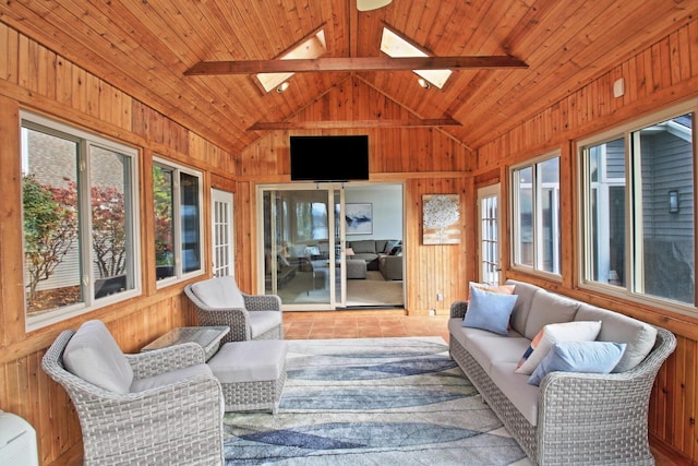 sunroom / solarium with vaulted ceiling with skylight and wooden ceiling