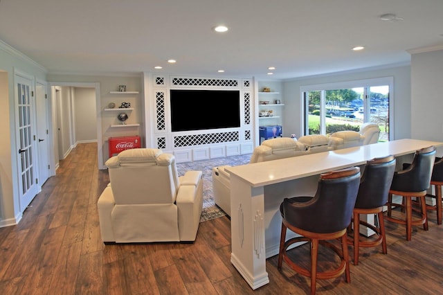 living room featuring recessed lighting, built in features, dark wood finished floors, and crown molding