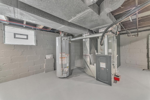 below grade area featuring heating unit and gas water heater